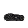 Sole of a shoe that is black and yellow and has Keen branding in silver on the base of the shoe.