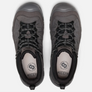 Top view of a pair of shoes that are grey with black accents and the Keen logo on the inside footbed of the shoe against a white background.