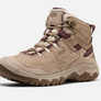Side view of a tan boot with purple accents against a white background.