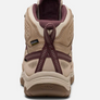 Back view of a tan boot that has purple accents against a white background.