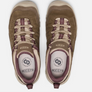Top view of a pair of light brown shoes that has tan and dark purple accents and the Keen logo on the tongue of the shoe against a white background.