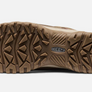 Light brown sole of a shoe that has the Keen logo on the bottom of the shoe and is against a white background.