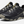 Pair of black shoes with Tan and white accents and the Keen logo on the side against a white background.