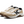 A pair of white shoes with tan and black accents that has a black K on the side of the shoe.
