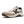 Side view of a white shoes with tan and black accents and has a large black K on the side of the shoe.
