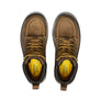 Pair of brown work boots with yellow soles on a white background