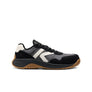 Black and white Keen safety shoes with brown sole on a white background
