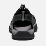 Back view of a black and grey sandal against a white a background.