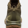 Back view of an olive green shoe with khaki accents against a white background.