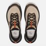 Top view of a tan shoe that has dark brown and orange accents with the Keen logo on the tongue of the shoe.
