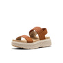 Brown sandal with a beige sole on a white background