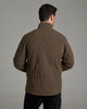 Back view of a person wearing a dark brownish green jacket.