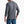 Back view of a person wearing a long sleeve grey shirt with blue jeans against a white background.