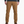 Person wearing tan pants with a grey shirt and brown shoes against a white background.
