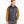 Person wearing a navy colored vest with an orange shirt against a white background.