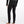 Back view of a person wearing black pants that has a black waist band that says LL Bean in a light grey color.