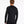 Back view of a person wearing a black long sleeve shirt against a white background.