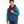 Person wearing a multi-colored 1/4 zip jacket with a hood against a white background.