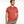 Man wearing a red t-shirt with a brand logo on a white background