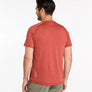Man wearing a red t-shirt on a white background
