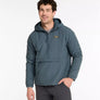 Person wearing a 1/2 zip jacket that is a dark muted blue color against a white background.
