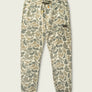 Pale camo colored sweat pants against a cream colored background.