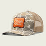 Camo trucker hat with Marsh Wear patch on the front with a mesh back on a light grey background