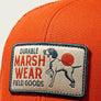 Marsh Wear Patch with a dog on it against a blank background