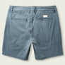 Back view of blue shorts with pockets on a blank background