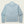 Light blue ribbed sweater on a beige background