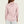 Person wearing a pink long sleeve shirt with a hood on a plain background