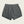 Gray shorts with a pocket on a beige background