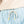 Up close view of frosty green shorts that have a drawstring