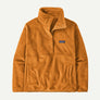 Golden orange 1/2 button fleece pull over sweatshirt that has the Patagonia logo on the from right side against a whit background.