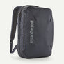 Front view of a grey backpack that has a Patagonia logo in light grey on the front against a white background.