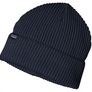 Navy blue knitted hat that folds up and has a Patagonia tag on the folded up part.