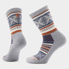 Pair of gray socks with patterned cuffs on a light gray background
