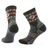 Pair of black, gray, and orange patterned socks on a white background