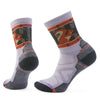 Pair of gray socks with squirrel patterns on a light purple background