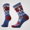Pair of blue and red socks with winter-themed design on a light gray background