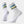 White socks that have light blue, tan, black and lime green accents.