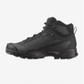 Side view of an all black shoe with Ultra 5 on the side in small writing against a white background.