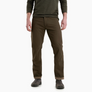 Person wearing brown pants and a green shirt on a white background
