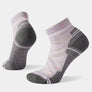 Pair of grey and purple socks on a grey background