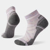 Pair of grey and purple socks on a grey background