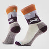 Pair of socks with nature-themed design on a white background