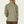 Back view of a person wearing a sage green long sleeve with brown pants against a white background.