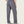 Back view of a person wearing grey sweatpants that has one pocket on the right side.