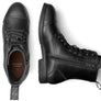 Top view of a boot stand straight up an then another boot on its side against a white background.
