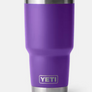 Purple tumbler with stainless steel accents and the Yeti logo on the front bottom.